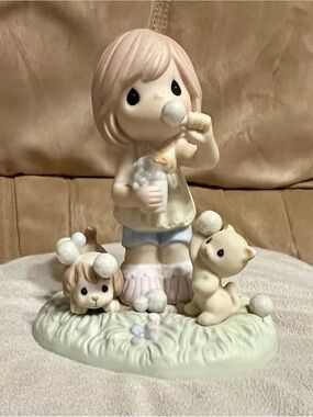Retired Precious Moments porcelain figurine titled "Bubbling Over With Fun” 2007
